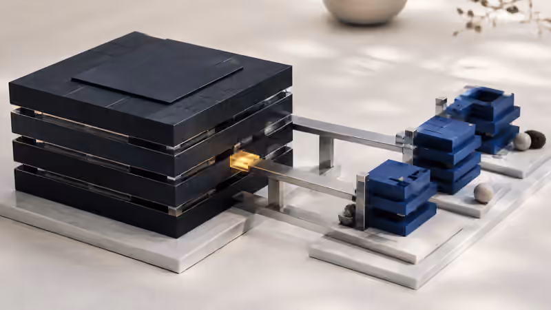 An intact navy structure linked by metal bridges to new blue modules; an amber connection marks the transition.